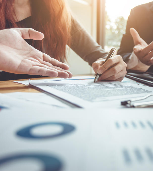 Business Signing a Contract Buy - sell house.